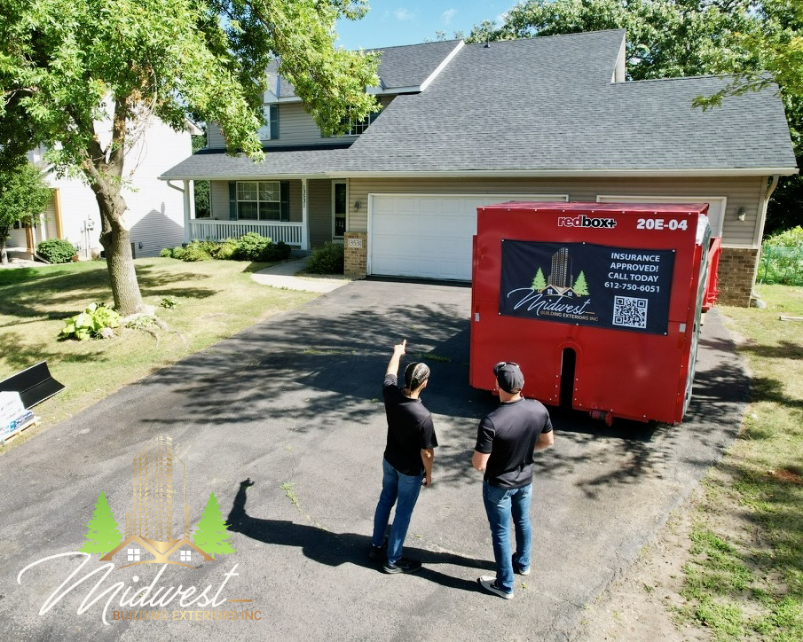 MBE project manager reviewing roofing options with a Twin Cities homeowner
