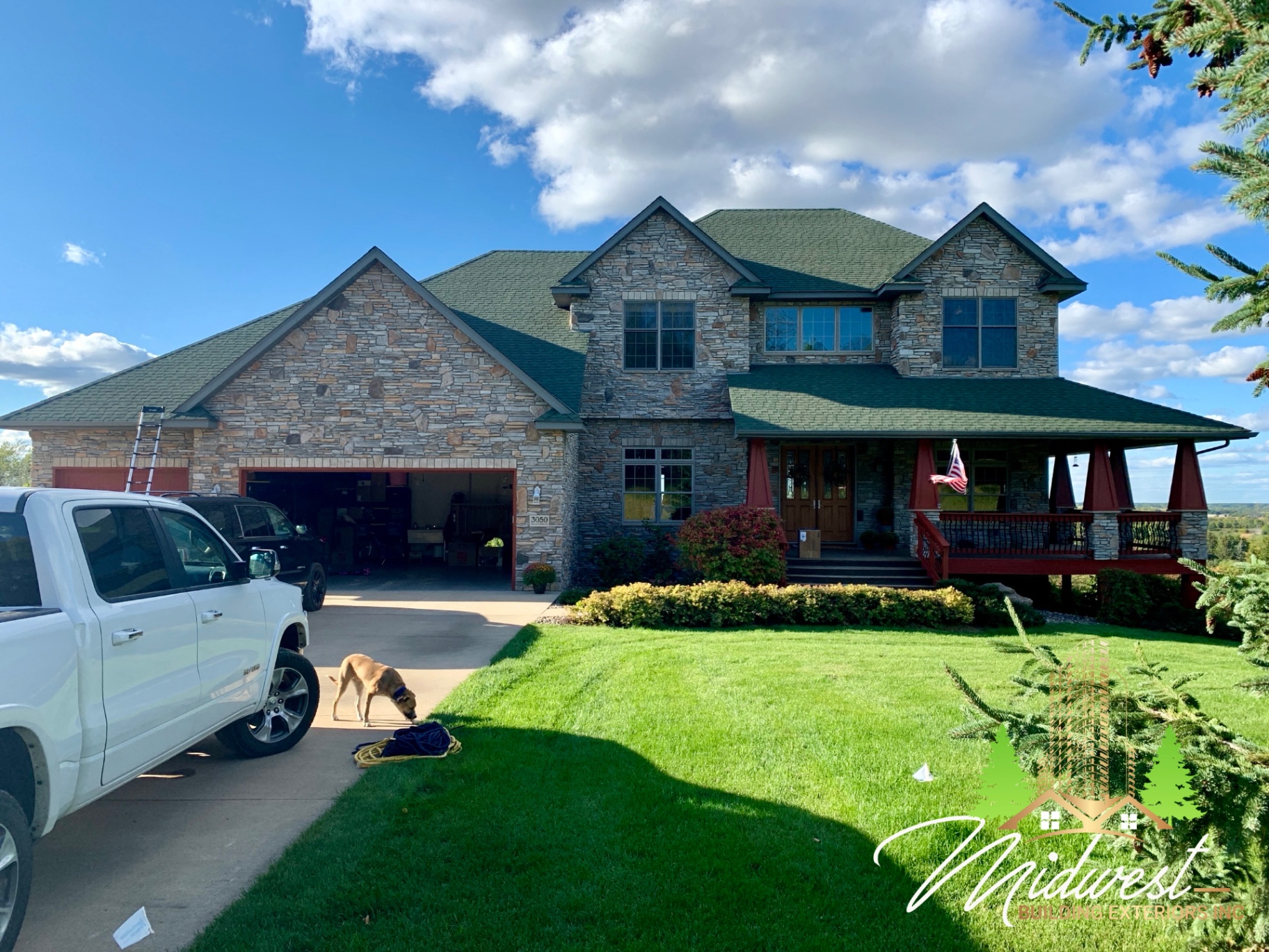 Green asphalt shingle roof on stone craftsman — Minneapolis, MN
