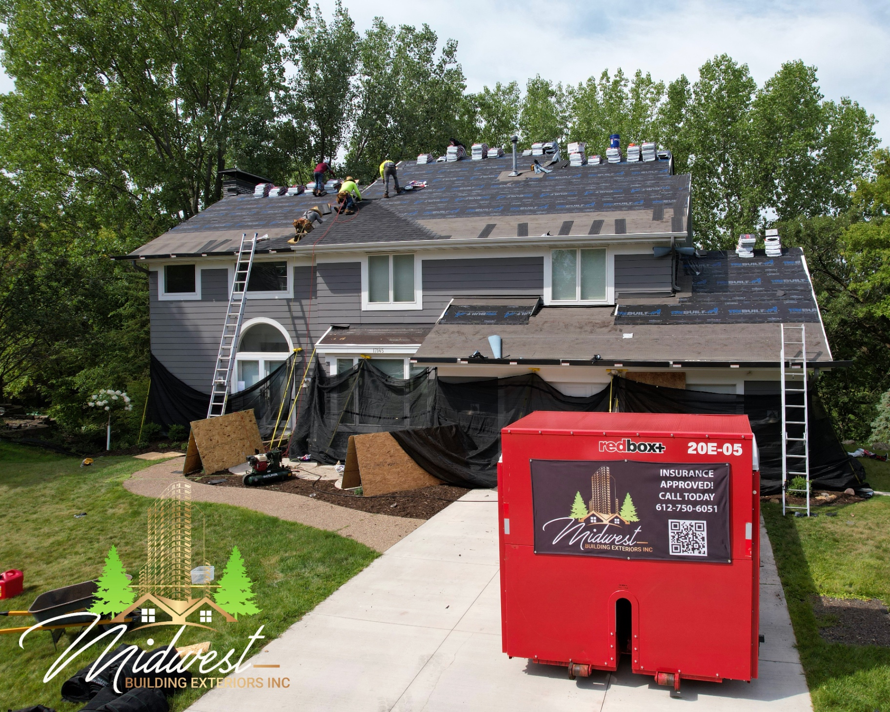 Front elevation of active storm restoration project with full property protection in place